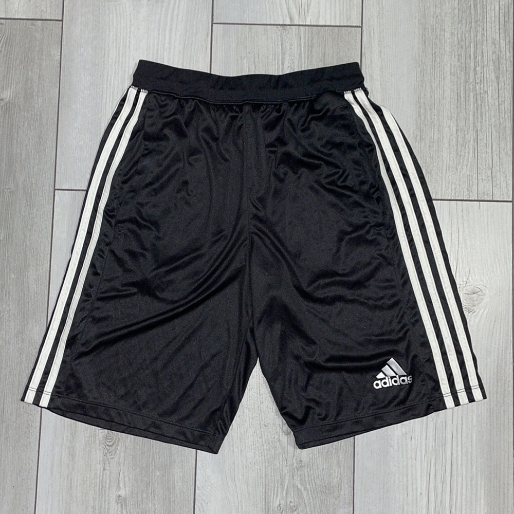 Adidas black Nike with white striped basketball shorts size small